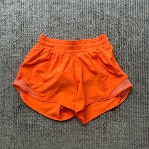 Lululemon 4’ sonic orange shorts